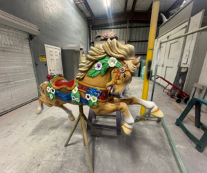 Picture of a fiberglass custom painted carousel horse.